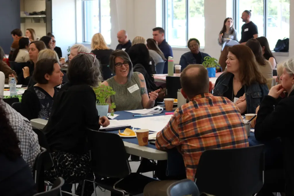 A group of people sitting at a table